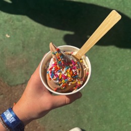 a person holding ice cream