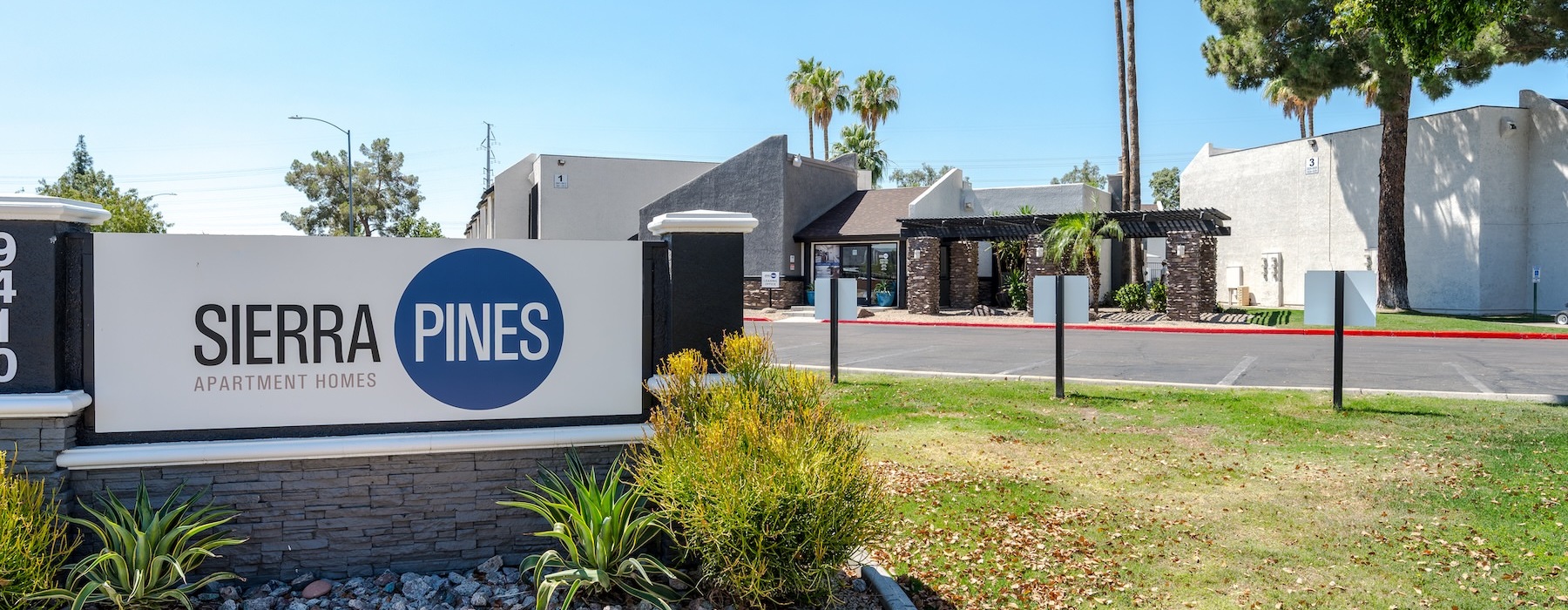 a sign in front of a building